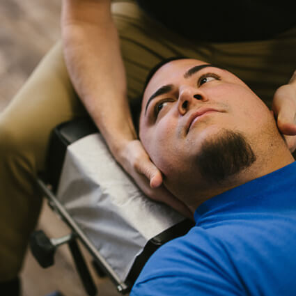 Chiropractic adjustment in progress